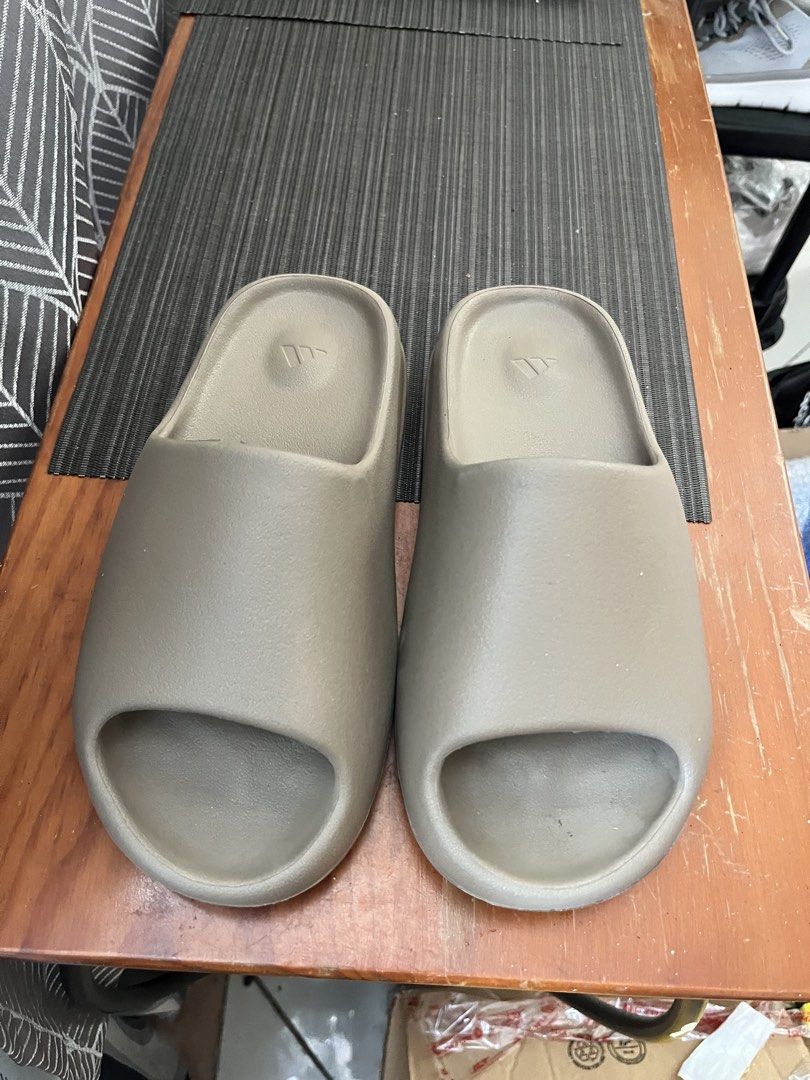 Adidas Yeezy slides (Category: Slippers & Slides) located in Las Pinas. Submitted by deepsouthe (Listing ID 1468993994, Image 3). Description: Adidas Yeezy slides M7, W9, 7uk, 40eu, 25.5cm Like new, 2x used only Php1,200 plus sf Las Pinas area.