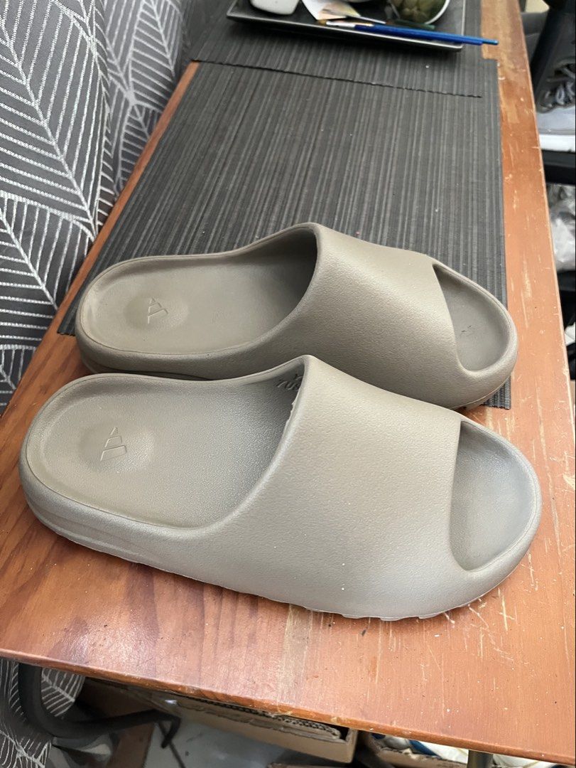 Adidas Yeezy slides (Category: Slippers & Slides) located in Las Pinas. Submitted by deepsouthe (Listing ID 1468993994, Image 1). Description: Adidas Yeezy slides M7, W9, 7uk, 40eu, 25.5cm Like new, 2x used only Php1,200 plus sf Las Pinas area.