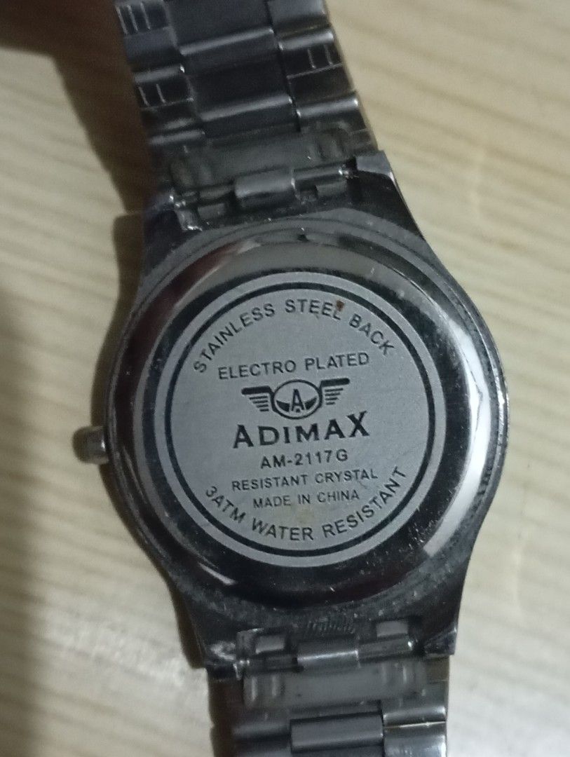 Adimax (Category: Men's Watches) located in Las Pinas. Submitted by quick_deals_great_finds2 (Listing ID 1469099277, Image 3). Description: Original good working condition Quartz with battery 40mm adjustable wrist size.