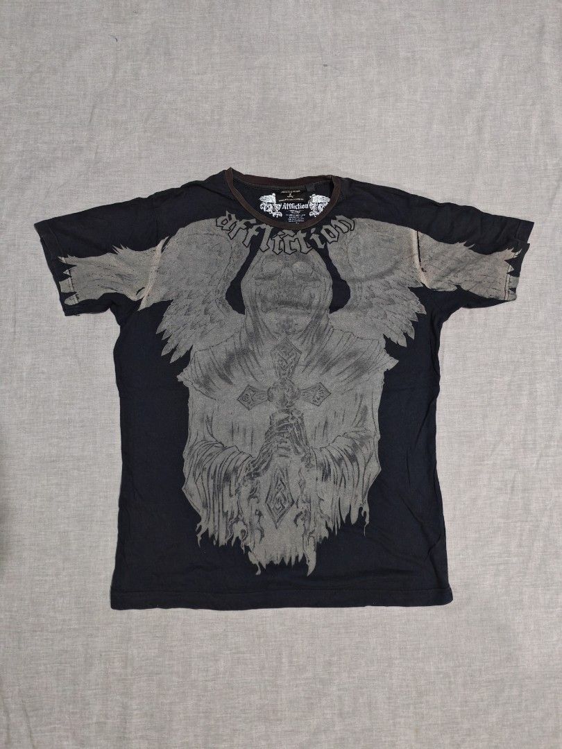 Affliction as pack mens / womens (Category: Tshirts & Polo Shirts ) located in Baguio. Submitted by used_clothing2600 (Listing ID 1469096373, Image 2). Description: Selling as pack Affliction mens size large made in USA Good condition minimal signs of usage W-22 x L-28 Affliction womens size XL excellent condition W-17.5 x L-20 P 2,000.