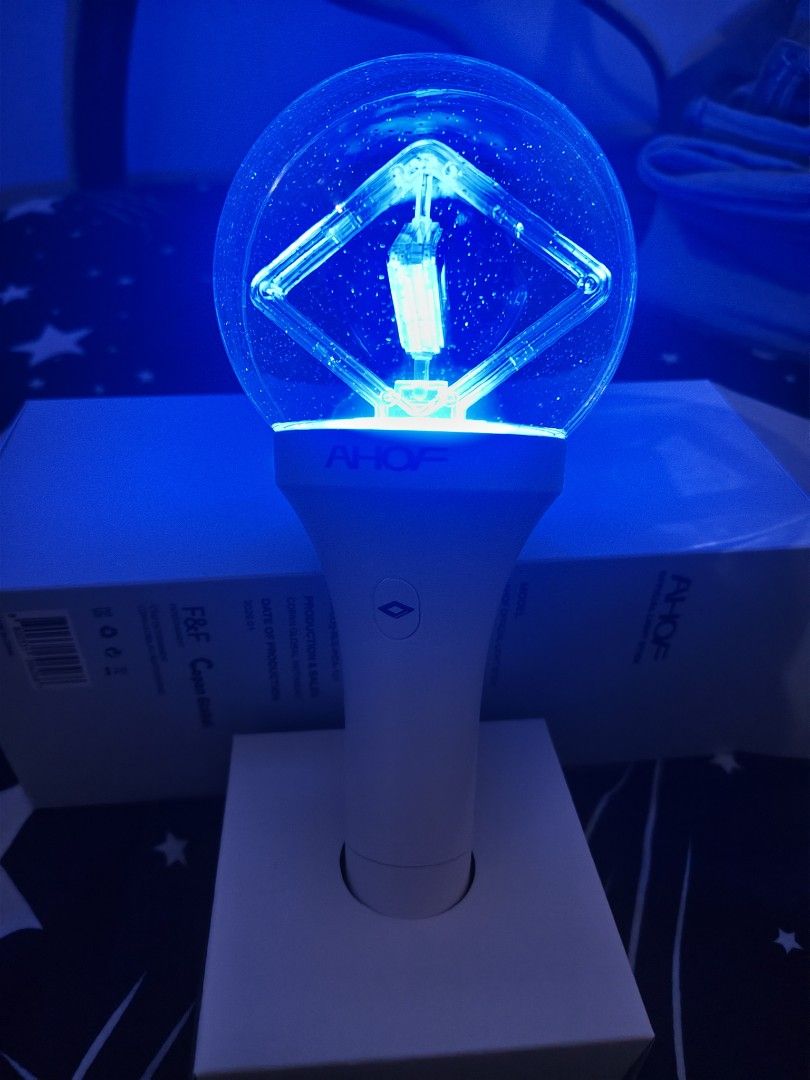 AHOF Official Lightstick (Category: Lighting) located in Manila. Submitted by lizzys00 (Listing ID 1469153947, Image 2). Description: - Official AHOF lightstick with original white packaging box - Tested and fully working with bright blue light - Design: White handle and blue glowing orb with a diamond inner structure - Includes attached wrist strap - Perfect for concerts and fan gatherings.