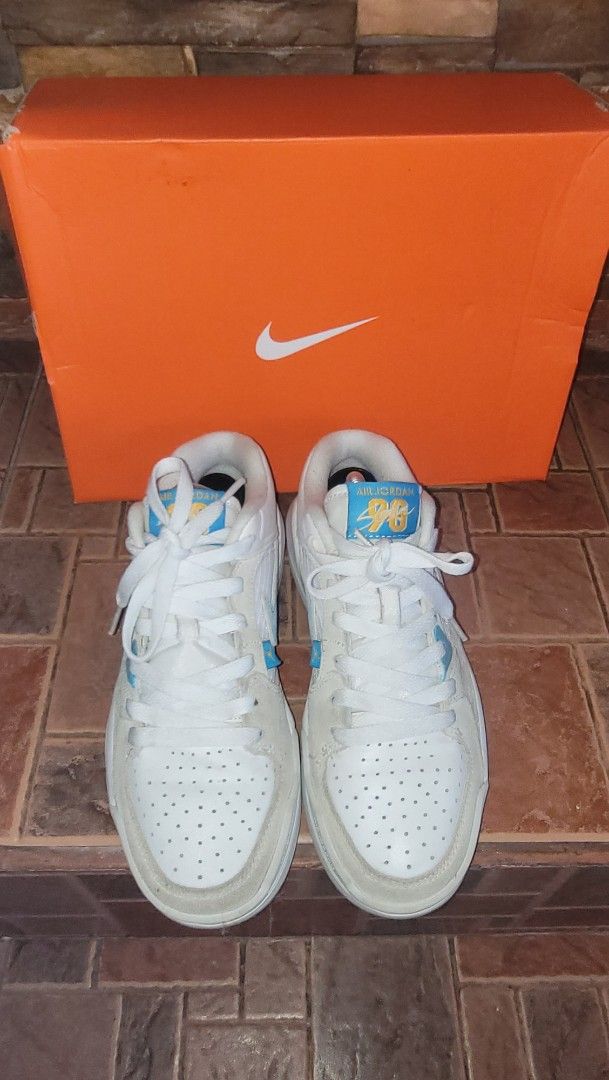 Air Jordan Sneakers size US 4y (Category: Babies & Kids Fashion) located in Imus. Submitted by ginatolentino1728 (Listing ID 1468949256, Image 1). Description: - Brand: Nike Air Jordan - Colorway: Crisp white with vibrant blue and yellow tongue tags - Condition: Clean uppers and soles, well-maintained - Inclusions: Comes with original orange Nike shoebox - Laces: Original white laces included - Mode of Payment/Delivery: PM for shipping or meetup 