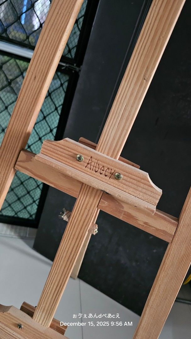 Albeecy Wooden Art Easel Stand (Category: Art & Prints) located in Dasmarinas. Submitted by jazvielle (Listing ID 1469085202, Image 3). Description: - Brand/Model: Albeecy Wooden Art Easel - Material: Solid wood with natural grain finish - Features: Adjustable height setup with secure screw fasteners - Structure: Stable tripod frame, ideal for canvases and drawing boards - Storage: Folds completely flat when not in use.