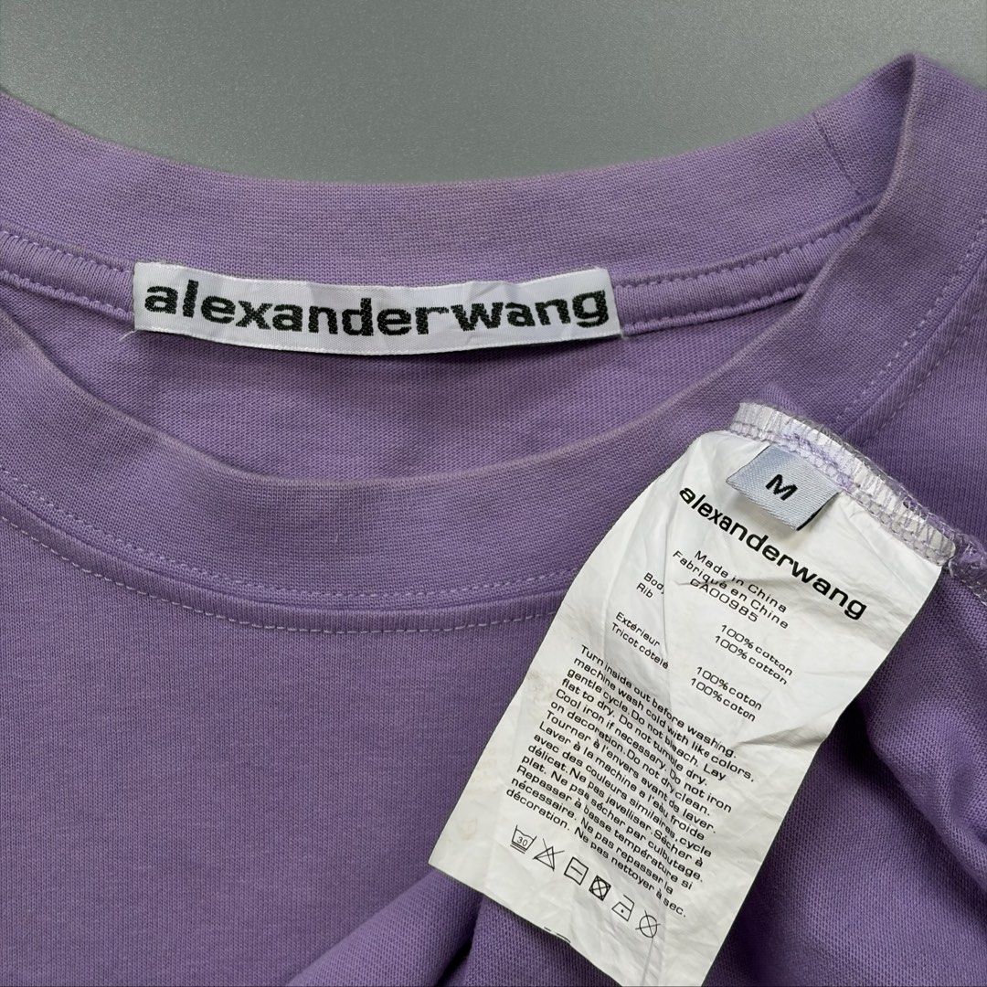 Alexander Wang (Authentic) (Category: Luxury Apparel) located in Cavite. Submitted by onebeancent (Listing ID 1469021550, Image 3). Description: Size: Medium Dimension: 20" Width | 28" Length Color: Purple Color Rate: 9.8/10 Issue: See last pic yellow stain di din gaano halata Condition: Almost new Price: 950php Additional Shipping Fee (J&T Medium Pouch) 75php Luzon 100php visayas 120php mindanao.