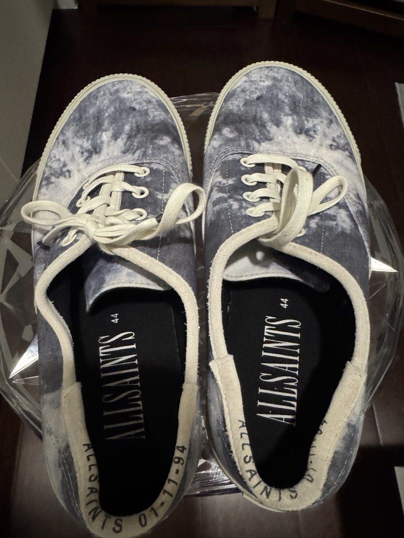 AllSaints Tie-Dye Canvas Sneakers Size 44 (Category: Sneakers) located in Pateros City. Submitted by dependingonvibe (Listing ID 1469003671, Image 1). Description: - Brand: AllSaints - Style: Canvas sneakers in blue and white tie-dye print - Size: EU 44 - Details: Contrast white laces, rubber soles, and branded black insoles - Condition: Uppers are clean; minor wear on soles with slight sticker residue on the left outer sole Worn ONCE. .