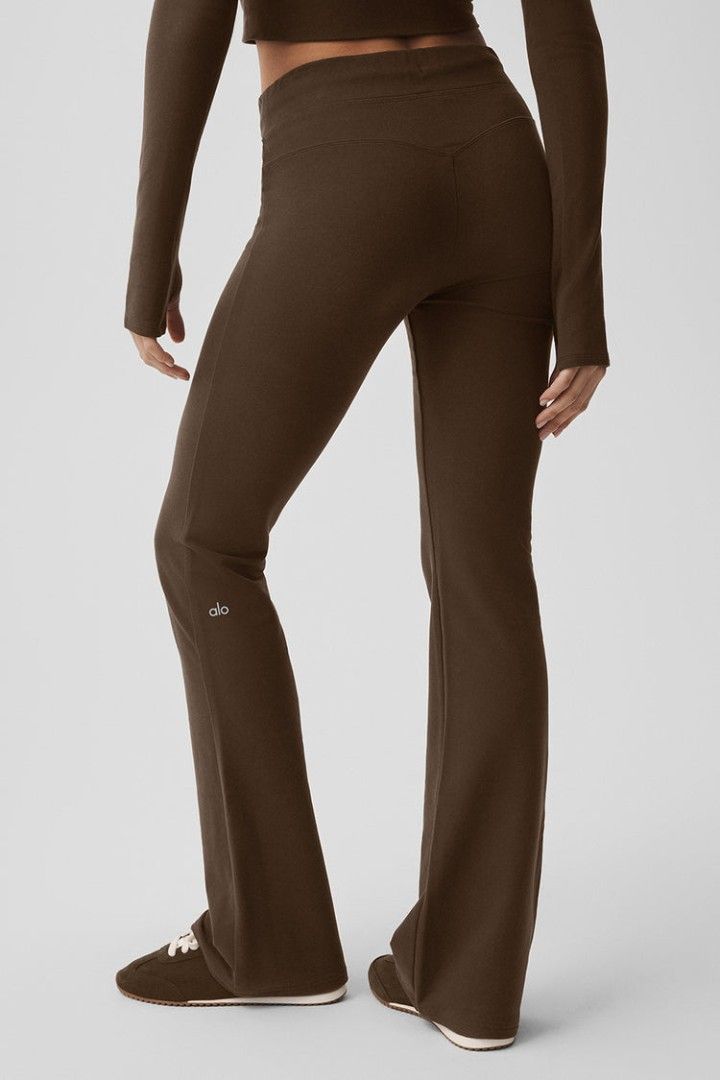 Alo Yoga Brown Flared Pants (Size small) (Category: Activewear) located in Manila. Submitted by liz_gatz (Listing ID 1468953055, Image 1). Description: - Brand: Alo Yoga - Style: Flared lounge pants - Color: Brown - Features: Adjustable drawstring waistband, small white alo logo near the right ankle - Condition: Good overall - Ideal for: Workouts or relaxing at home.