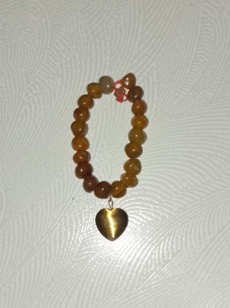 Amber Bead Bracelet with Heart Charm (Category: Bracelets) located in Bacolod City. Submitted by beam_tori (Listing ID 1468994787, Image 1). Description: - MOP: Gcash - MOD: J&T.