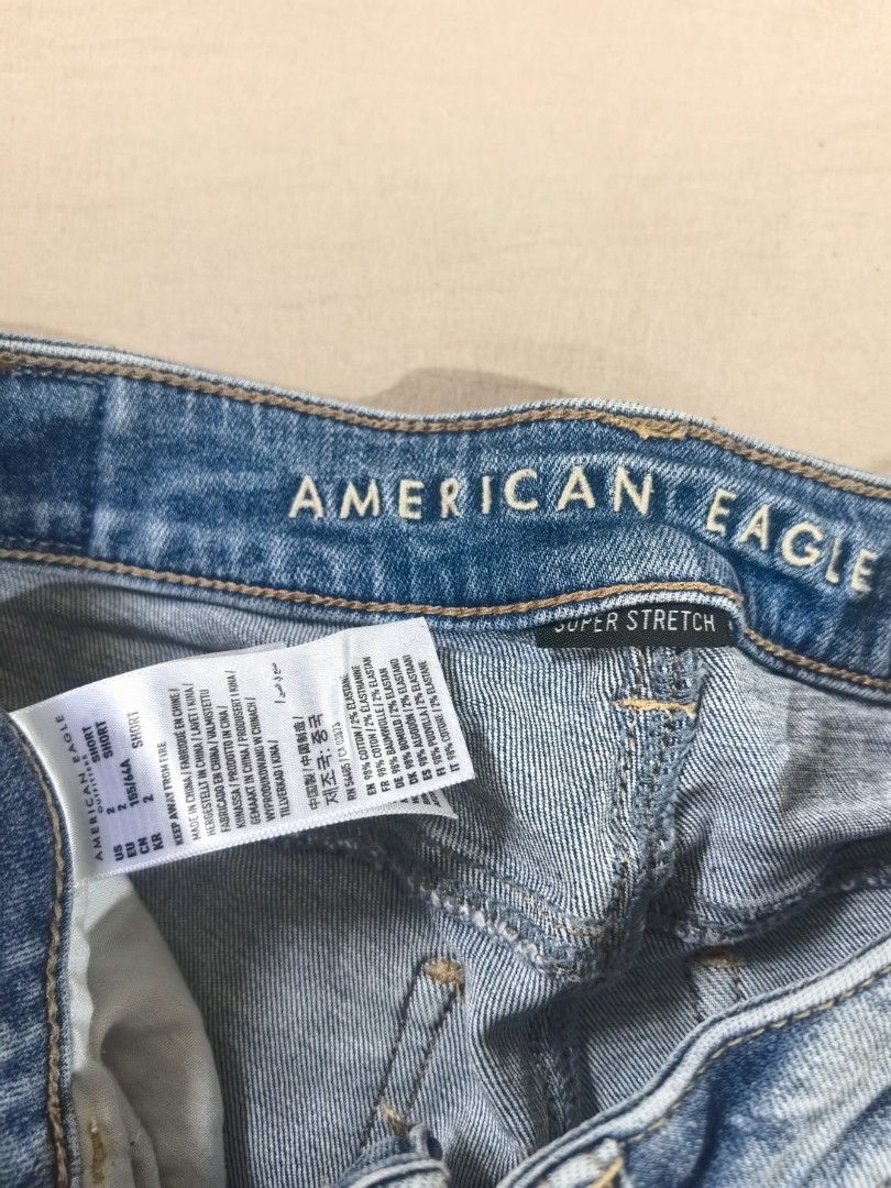 American Eagle Super Stretch Distressed Light Wash Jeans Size 2 Short (Category: Jeans) located in Tacloban City. Submitted by thead.declutters (Listing ID 1469084208, Image 2). Description: - Brand: American Eagle - Size: 2 Short (Mid-rise waist) - Color/Wash: Light blue - Material: Super soft (98% cotton, 2% elastane) - Details: Distressed knee rips and raw frayed hems - Condition/Style: Great casual everyday staple.