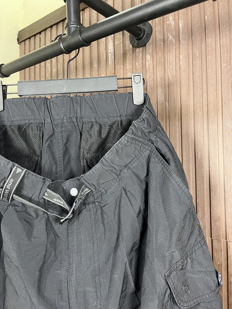 And wander Oversized Cargo Shorts (Black) (Category: Shorts) located in Cabanatuan. Submitted by cabsygoods (Listing ID 1469101512, Image 2). Description: And wander Oversized Cargo Shorts (Black) Authentic Waistline: 33 - 34 Length: 22 Very good condition No issue Color rate 9/10 Dm to purchase! 📩.