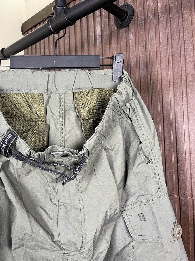 And wander Oversized Cargo Shorts (Olive green) (Category: Shorts) located in Cabanatuan. Submitted by cabsygoods (Listing ID 1469101792, Image 2). Description: And wander Oversized Cargo Shorts (Olive green) Authentic Waistline: 33 - 34 Length: 22 Very good condition No issue Color rate 9/10 Dm to purchase! 📩.