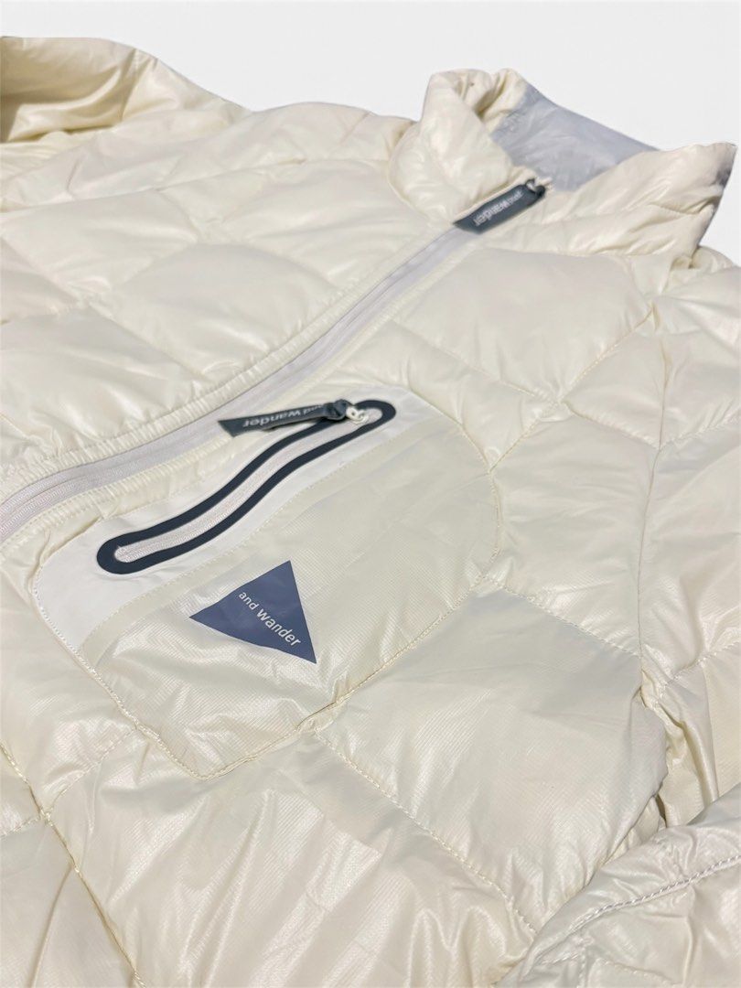 AND WANDER DIAMOND STITCH DOWN JACKET (Category: Coats, Jackets and Outerwear) located in Dasmarinas. Submitted by nvrgobrkagain. (Listing ID 1469069320, Image 2). Description: -Offwhite color diamond stitch puffer jacket WIDTH : 23 IN LENGTH : 28 IN Excellent condition (ready to use).