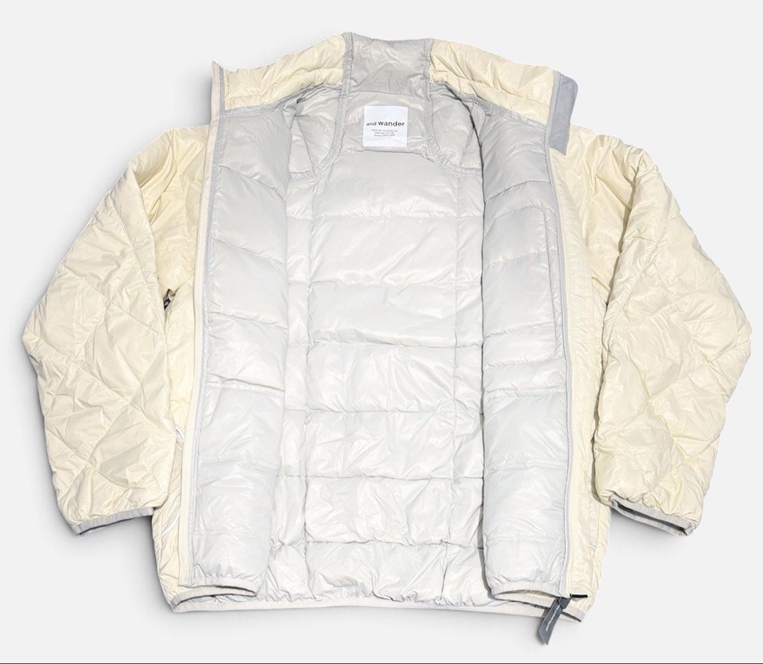 AND WANDER DIAMOND STITCH DOWN JACKET (Category: Coats, Jackets and Outerwear) located in Dasmarinas. Submitted by nvrgobrkagain. (Listing ID 1469069320, Image 3). Description: -Offwhite color diamond stitch puffer jacket WIDTH : 23 IN LENGTH : 28 IN Excellent condition (ready to use).