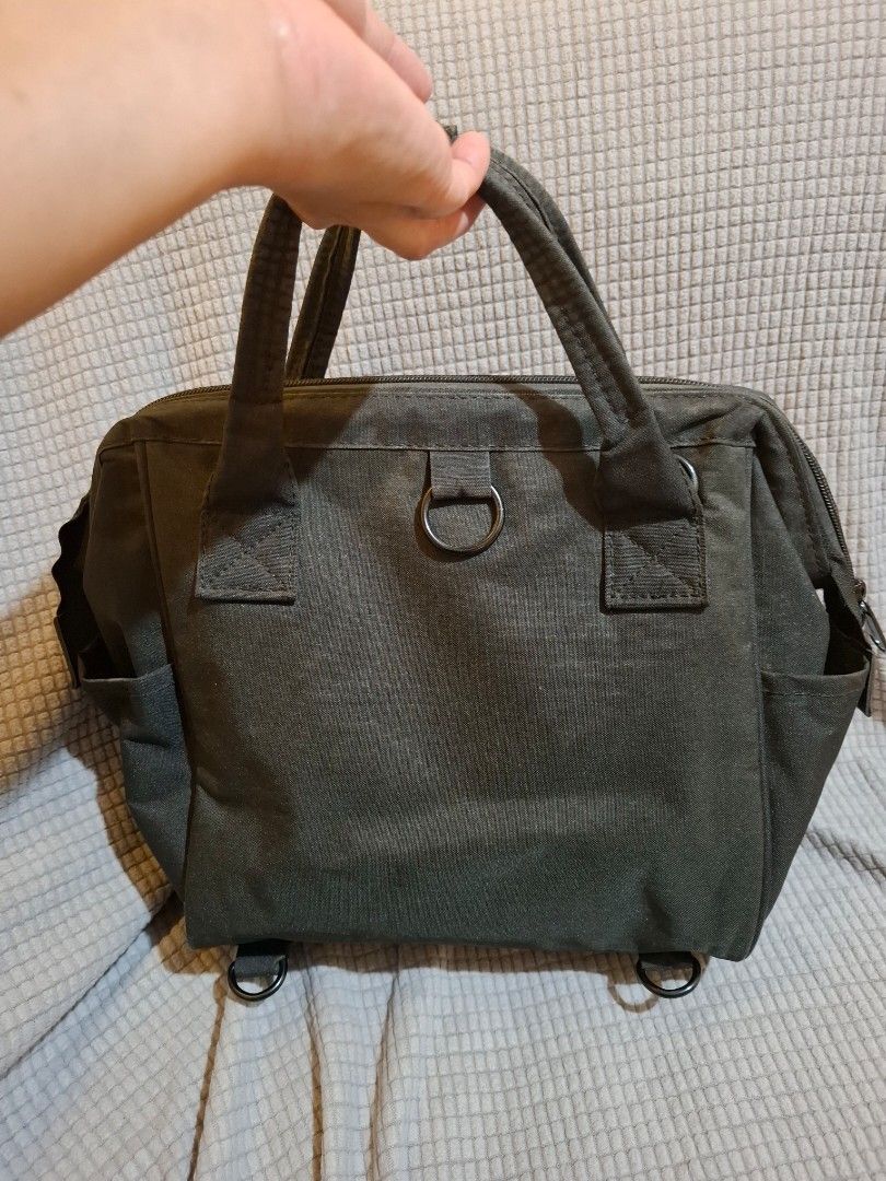 Anello two-tone canvas handbag with front pocket (Category: Luxury Bags & Wallets) located in Muntinlupa City. Submitted by googoosh_collection (Listing ID 1468940880, Image 2). Description: - Brand: Anello - Color: Grey and Dark Grey with Light Blue interior - Material: Durable canvas - Features: Dual top handles, front zip pouch, exterior metal hardware rings - Interior: Clean light blue lining equipped with a zip pocket and convenient slip com