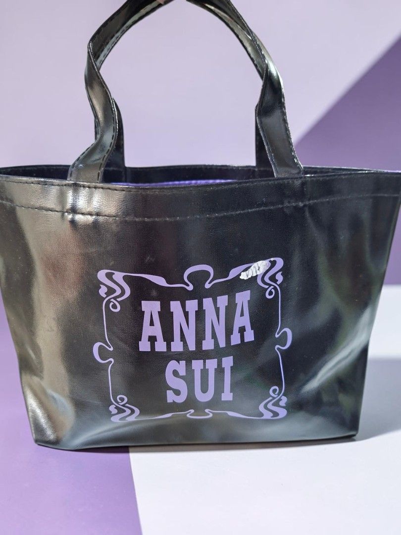 ANNA SUI MINI LEATHER OPEN TOTE (Category: Tote Bags) located in Las Pinas. Submitted by annachiaonair2037 (Listing ID 1469057839, Image 1). Description: ANNA SUI MINI LEATHER OPEN TOTE FROM JAPAN MINIMAL SIGN OF USAGE SA CORNERS KAYA IPENTEL PEN TO COVER H 6" L.9" W 3" Disclaimer: I am not affiliated with, associated with, or authorized by any of the brands featured posted. Any mention of brand names, trademarks, or logos is solely for identific