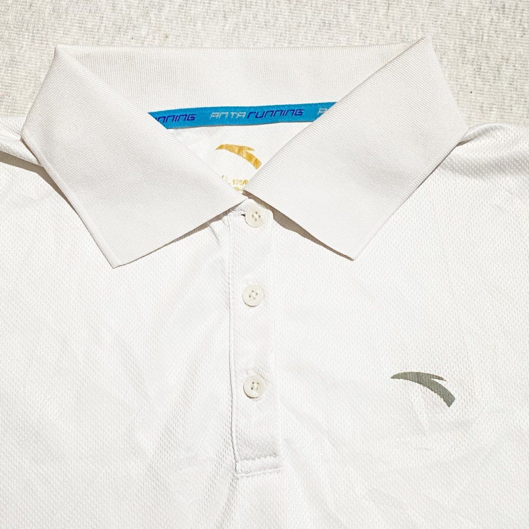 Anta Polo (Category: Activewear) located in Mabalacat. Submitted by stellargarments (Listing ID 1468976803, Image 2). Description: Length : 23 Width : 18 Condition : 9/10 makinis pa tela with complete anta buttons with necktag very comfy & smooth on skin medjo lukot pa po need wash dirt sa collar no major yellow stain color may vary due to lighting.