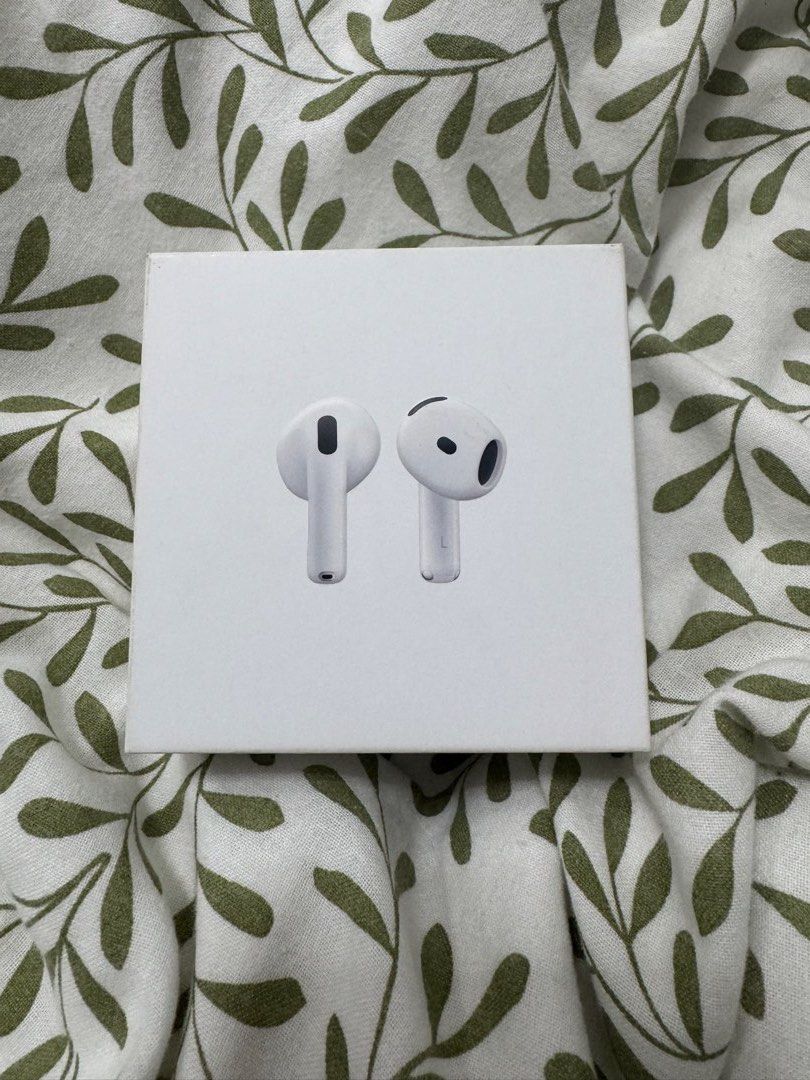 Apple AirPods 4 (Non ANC) (Category: Earphones) located in Manila. Submitted by truecrit (Listing ID 1469104923, Image 1). Description: - Apple AirPods 4 wireless earbuds - Original box included - left airpod has dot or minimal dents (shown in photos) - sound quality and battery is good as new. (item bought in may 2026) - USB-C charging compatible - Clean inside and out.