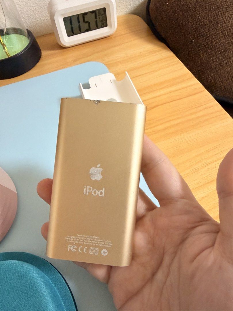 Apple iPod mini Gold 4GB (Category: Portable Music Players) located in Manila. Submitted by mochaclosetph (Listing ID 1468961091, Image 2). Description: - Model: Apple iPod mini - Storage Capacity: 4GB - Color: Gold - Condition: Fully functional, turns on and screen displays properly - selling as is long bat life can last upto 2 days or more depending on the usage - Inclusion: White plastic belt clip case and charger cord -location north caloocan