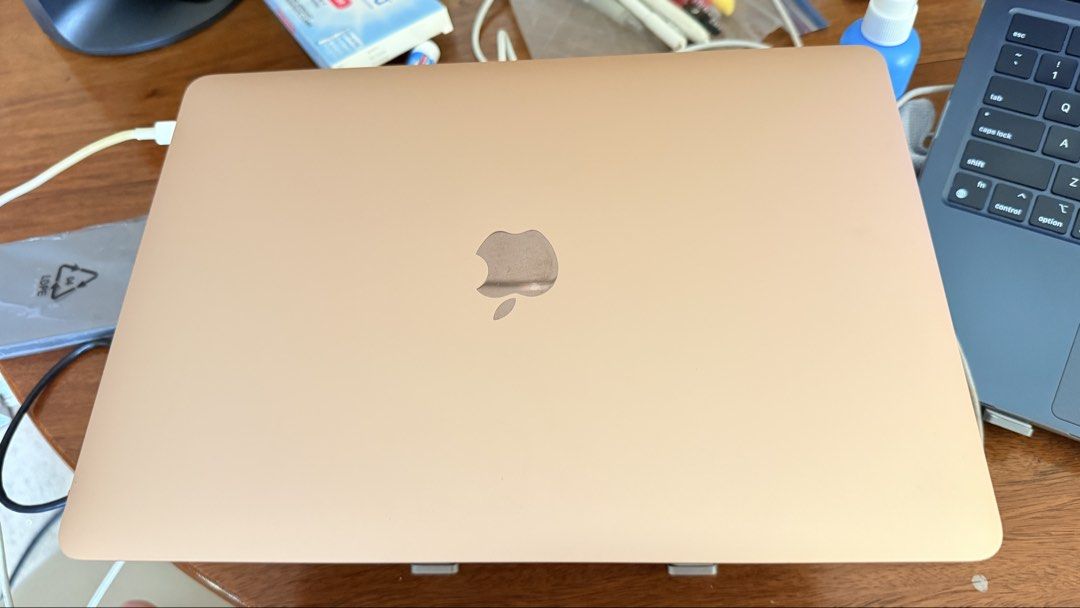 Apple MacBook Air Gold (Category: Laptops & Notebooks) located in Quezon City. Submitted by deklutterkate (Listing ID 1468932026, Image 2). Description: - Stunning rose gold metal chassis finish with few minor scratches - Standard keyboard layout with built-in trackpad - Includes a convenient sliding webcam privacy cover - Tested and working, shows Apple startup screen - Lightweight and highly portable MacBook Air - Perfect for students and profe