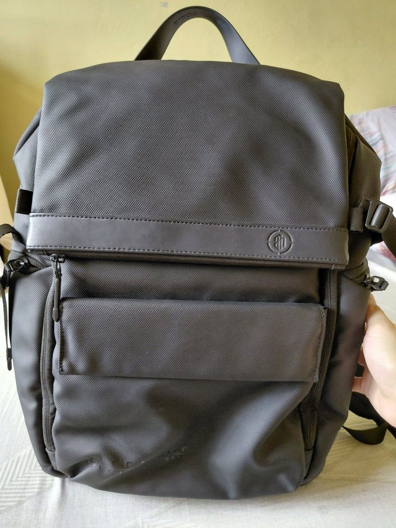 Arctic Hunter Laptop Backpack Black (Category: Backpacks) located in Cavite. Submitted by harveycaraan (Listing ID 1469074236, Image 1). Description: - Brand: Arctic Hunter - Color: Black - Design: Flap top closure with secure strap buckle - Organization: Multiple compartments, dedicated pen slots, phone pocket, mesh section, and key ring attachment - Comfort: Padded mesh shoulder straps and breathable back panel - Material: Durable water-resista