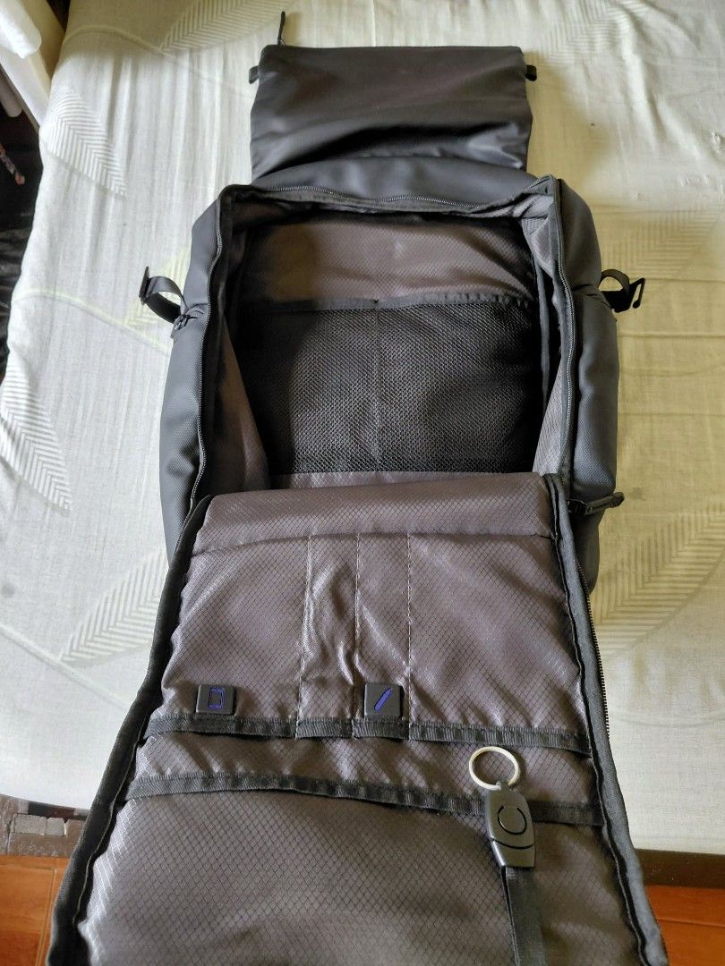 Arctic Hunter Laptop Backpack Black (Category: Backpacks) located in Cavite. Submitted by harveycaraan (Listing ID 1469074236, Image 3). Description: - Brand: Arctic Hunter - Color: Black - Design: Flap top closure with secure strap buckle - Organization: Multiple compartments, dedicated pen slots, phone pocket, mesh section, and key ring attachment - Comfort: Padded mesh shoulder straps and breathable back panel - Material: Durable water-resista