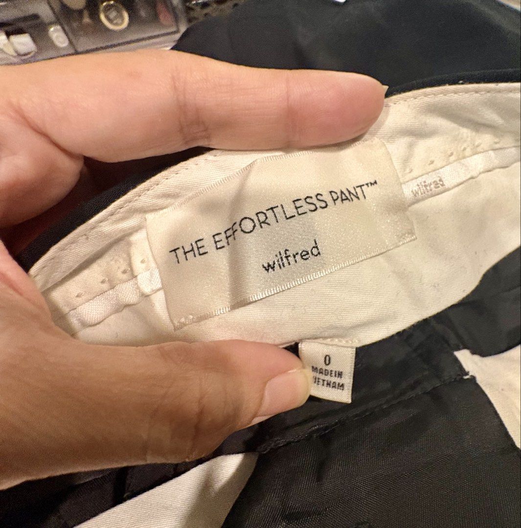 Aritzia The Effortless Pant in Black (Category: Other Bottoms) located in Taguig. Submitted by loise001_of_rewear (Listing ID 1469006073, Image 3). Description: Aritzia’s classic ‘The Effortless Pant’ in black. Size 0 but check the other photos and the size guide here: https://www.aritzia.com/intl/en/size-guide My waistline is 28” in the ‘When Worn’ photo. I am 5ft + wearing 2in heels for reference. I can wear Artizia’s pants in sizes 0-4. This i