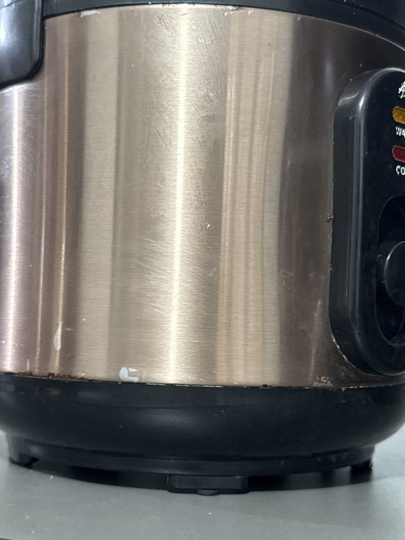 Asahi RC 53 Rice Cooker 5 cups (Category: Cookers) located in Caloocan City. Submitted by konmariwithcy (Listing ID 1468972794, Image 3). Description: - Brand: Asahi - Finish: Brushed stainless steel with black lid - Features: Standard cook/warm indicator lights and toggle switch - Condition: Fully functional, minor edge wear, body scuffs, and inner lid residue - Inclusion: Power plug included, With plastic steamer tray 5-cup (1-Liter) capacity 4