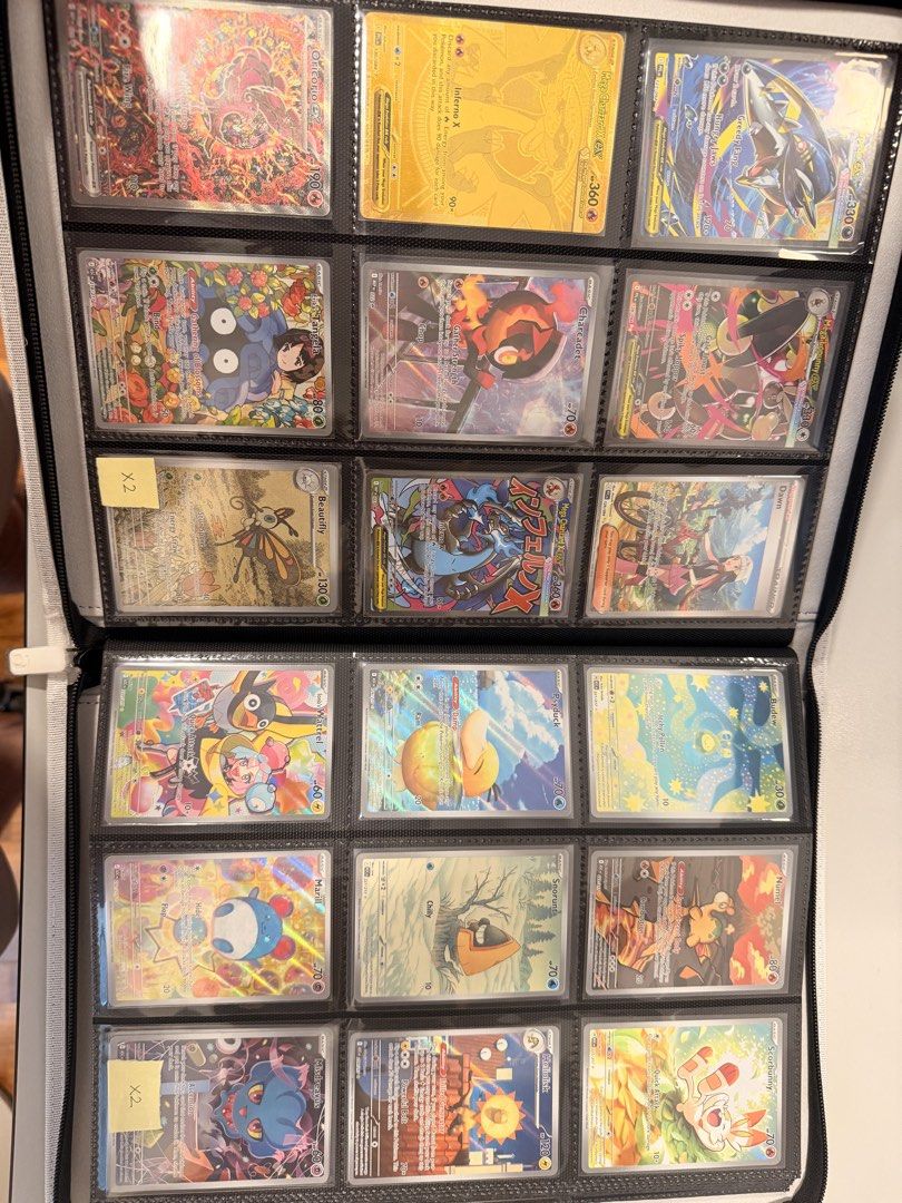 Assorted characters (Category: Raw Cards) located in Singapore. Submitted by lyxb94 (Listing ID 1469041011, Image 4). Description: Selling whole collection, include vaultx binder. Market value per collectr app = S$4,230 Fixed priced at 80% market value. What is included: - All cards in the photos (most valuable). - Additional 10 more pages in binder but no shown due to photo limit. - Additional $S 236 (market value) of EX cards..