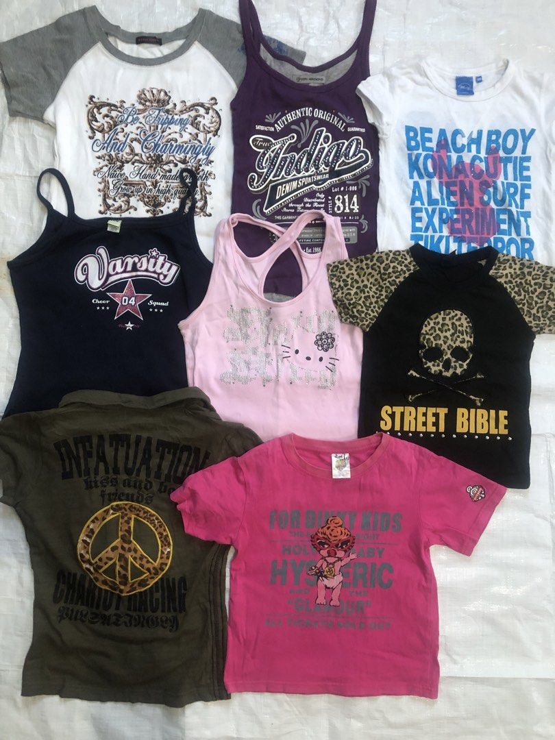 Assorted Vintage Graphic Tees and Tank Tops Bundle (Category: Tshirts & Polo Shirts ) located in Manila. Submitted by tunicy2k (Listing ID 1469056535, Image 3). Description: - Massive bundle of graphic tees and tank tops - Brands include American Eagle, Abercrombie & Fitch, and Aeropostale - Assorted colors: black, white, pink, blue, and green - Features prints, rhinestones, and embroidery in mixed sizes - Great for casual daily wear or Y2K stree