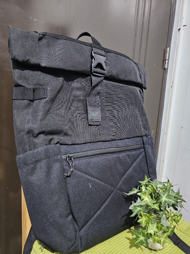 ASUS TUF Gaming Backpack Black (Category: Backpacks) located in Dasmarinas. Submitted by jazvielle (Listing ID 1469086566, Image 1). Description: - Brand: ASUS TUF Gaming - Color: All Black - Material: Sturdy, durable fabric build - Straps: Adjustable shoulder straps with quick-release buckle closure - Storage: Vertical zippered front pocket for fast access to essentials - Details: Embossed TUF Gaming patch on the front strap - Interior: Clean li