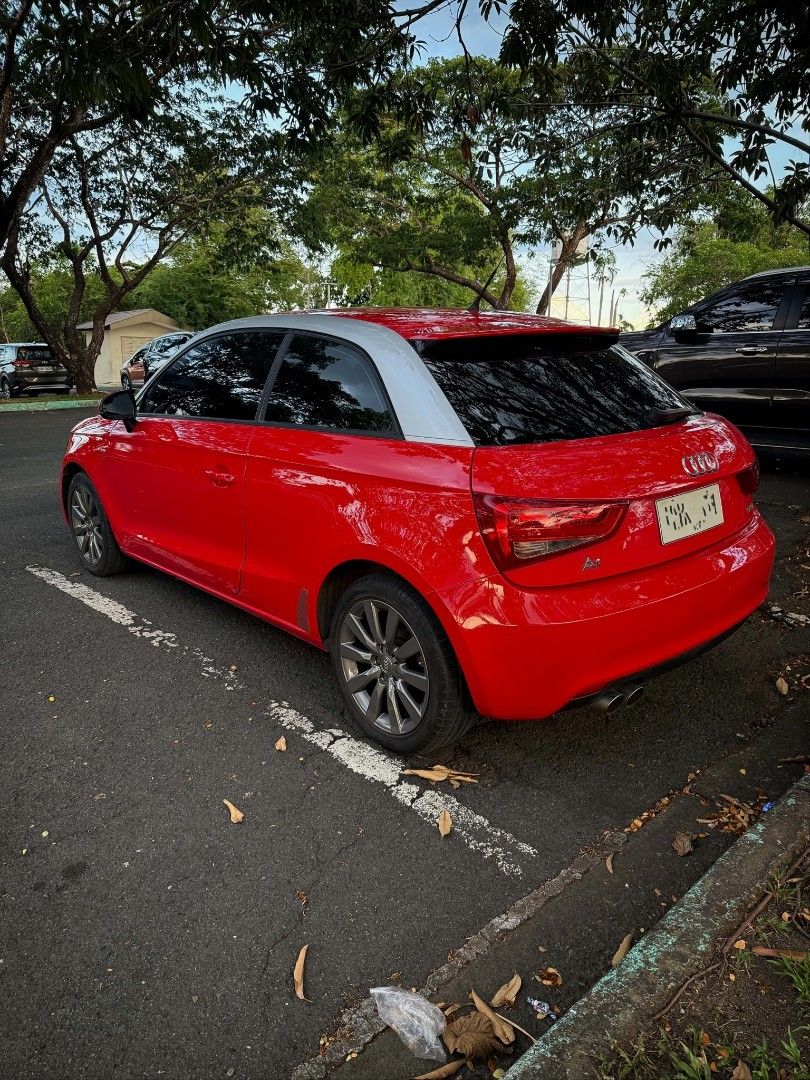 Audi A1 turbo SLINE Auto (Category: Used Cars) located in Manila. Submitted by goldenwhale-db20 (Listing ID 1469061754, Image 2). Description: Authentic "SLINE" Version of Audi A1 This version has an All black interior Leather S line Race seats upgraded suspension than the normal A1 1.4 TFSI ENGINE turbocharged Very Nimble, agile and Fast! Mileage 102,000km all stock and euro shop maintained Fuel efficient 2 DOOR. classy two tone Red and silver r
