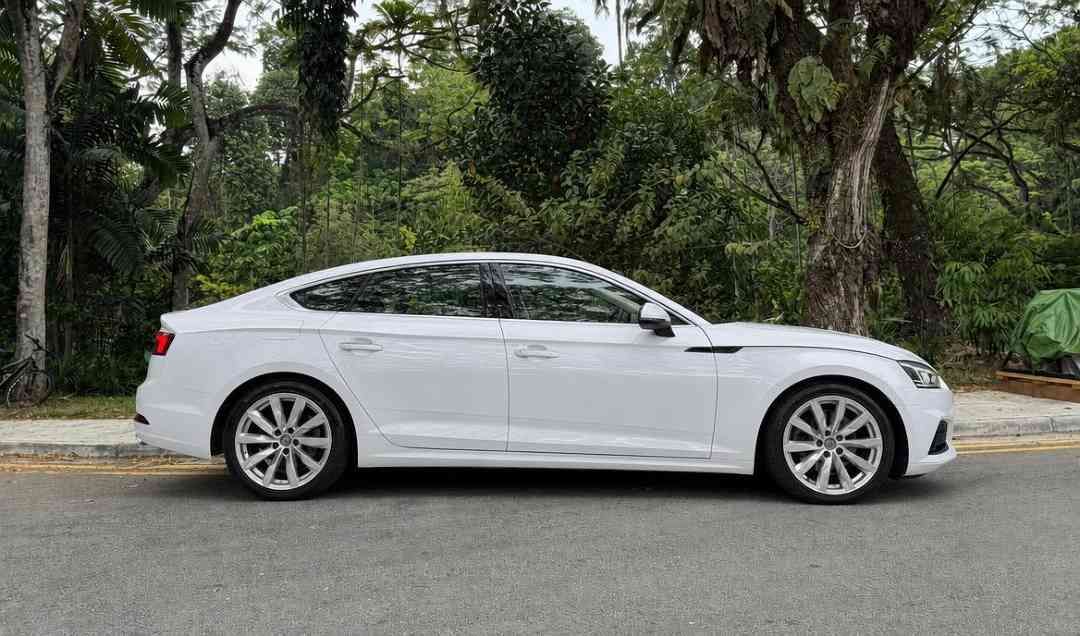Audi A5 Sportback 2.0 TFSI S tronic Design (A) (Category: Used Cars) located in Singapore. Submitted by carousell_certified_partners (Listing ID 1461478348, Image 2). Description: Rare 1 owner unit with low mileage of only 69,000km! Engine, gearbox and mu warranty till end COE! Excellent condition with no major repairs needed! Don't miss this sleek sportback with a comfortable legroom space and a huge boot storage space! Flexible bank and in hous