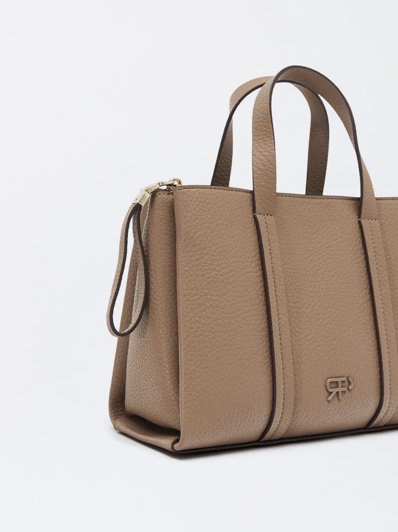 AUTH Parfois Brown Crossbody Satchel Bag (Category: Cross-body Bags) located in Manila. Submitted by bbygirly (Listing ID 1469086069, Image 1). Description: Parfois CA Women's Medium Crossbody Bag in Camel - Preloved used twice lang - No more dustbag - Dm for actual pics.