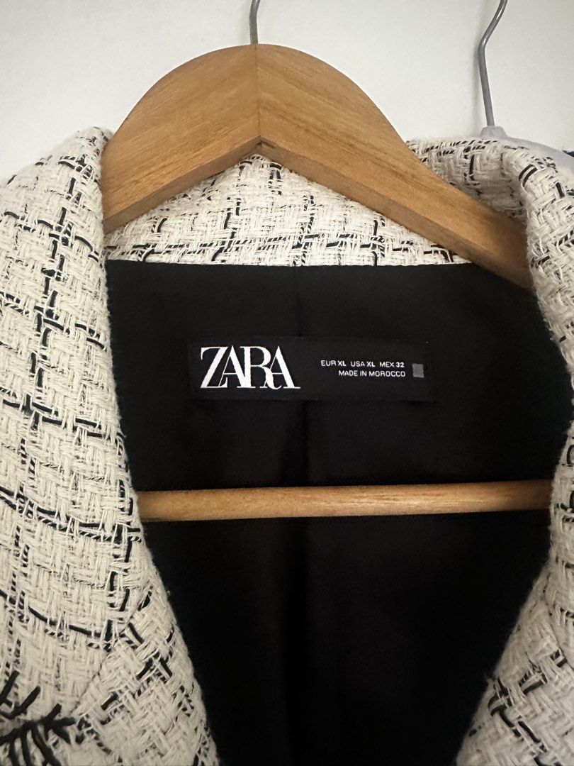 Auth Zara Tweed Blazer (Category: Coats, Jackets and Outerwear) located in Mandaluyong City. Submitted by hdvvv (Listing ID 1468939760, Image 3). Description: Zara Ecru/Black Textured Double-Breasted Blazer with Topstitching (also known as the Zara Textured Double Breasted Blazer) Size xl Almost new Rfs too many clothes.