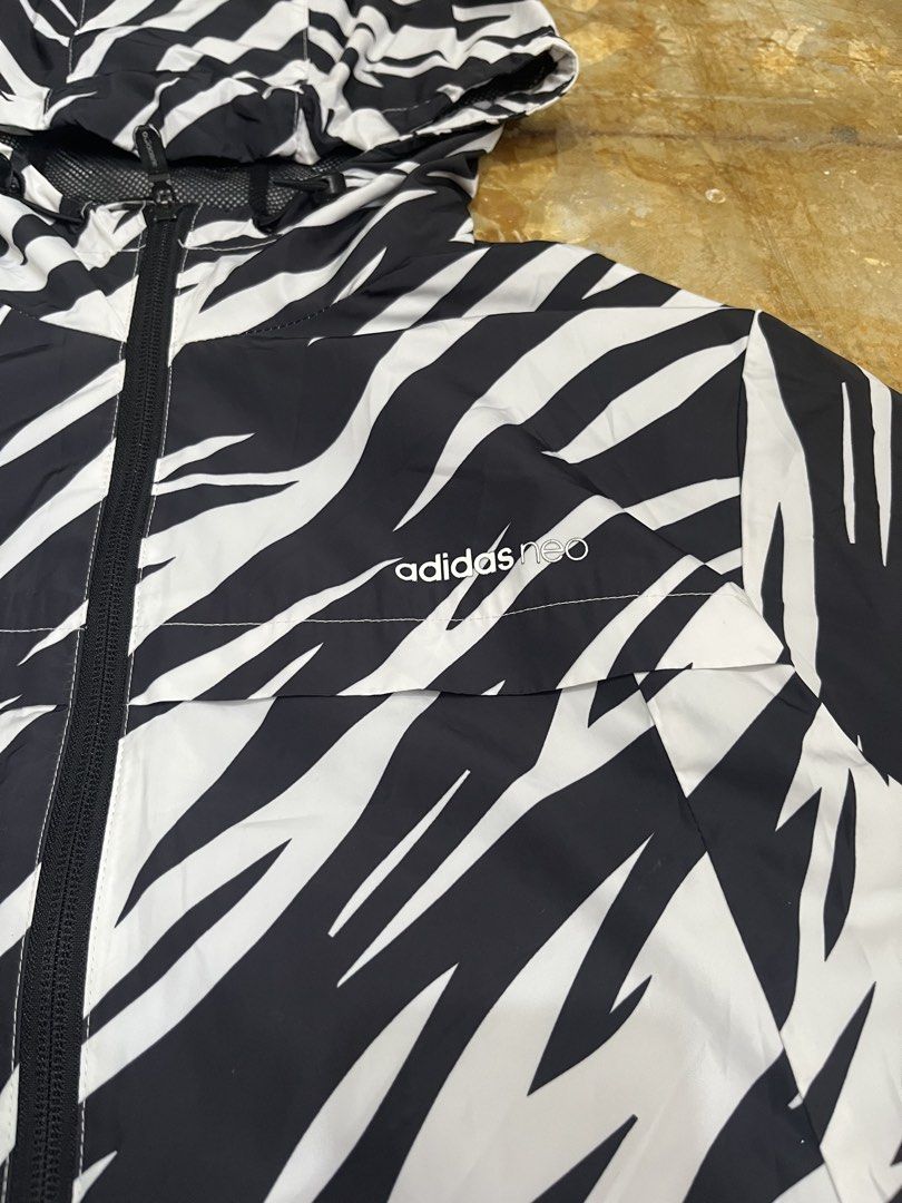 Authentic Adidas Neo Jacket Windbreaker (Complete tag) (Category: Coats, Jackets and Outerwear) located in Las Pinas. Submitted by 5.1.5kurono (Listing ID 1469114598, Image 2). Description: Available ✅ Adidas neo windbreaker jacket ₱800 • width: 21.5 • length: 28 Issue: • none 📍 las piñas, ph • j&t / lalamove 📦 • sf shouldered by buyer • gcash only 💸 (payment first) color may vary due to lighting all items are thrifted please manage your expec