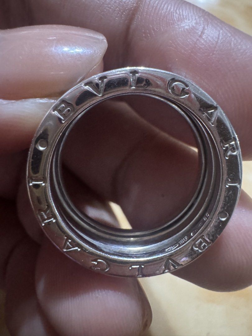 💯Authentic Bvlgari B.zero1 White Gold Ring Size 9 (Category: Rings) located in Bacoor. Submitted by praisedtoyoulord (Listing ID 1469094824, Image 1). Description: - Authentic Bvlgari B.zero1 ring in 18k white gold (Size 60 stamped inside) - Features the iconic spiral design with classic engraved BVLGARI lettering - Hallmarked with 750 and official Italian gold stamps - Solid, premium weight with a timeless luxury look - Condition: Minor surface