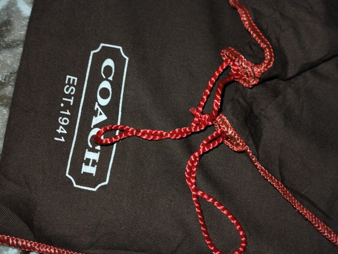 Authentic COACH dust bag dustbag (Category: Shoulder Bags) located in Zamboanga. Submitted by luxuryaccessories_ella.2022 (Listing ID 1469078836, Image 2). Description: Authentic 👉looks new 👉sized by cm ( centimeters) 👉 already wash 👉add sf 👉Loc po is Mindanao 👉 shipping thru J &T add 89 sa sf 👉MOP:Gcash or BPI.