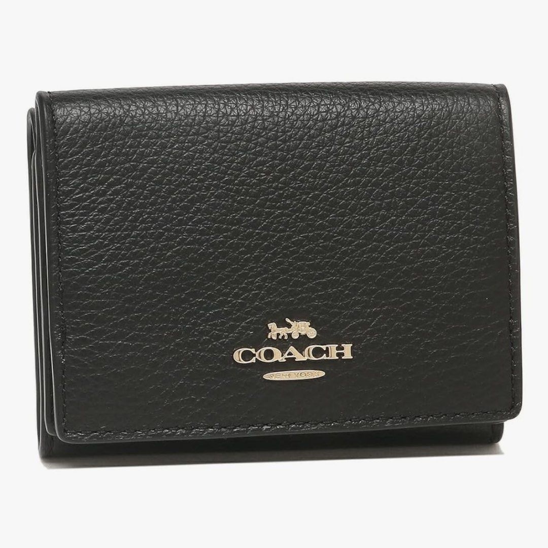 Authentic Coach Outlet Trifold Wallet Black (Category: Luxury Bags & Wallets) located in Imus. Submitted by camofproject.647 (Listing ID 1468958714, Image 1). Description: Authentic Coach Outlet Trifold Wallet Color: Black Size (W x H x D): Approx. 3.9 x 3.0 x 1.4 inches (10 x 7.5 x 3.5 Material: Leather Specifications: Closure Type: Snap, Interior Style: Bill compartment x 1, Open pocket x 3, Exterior Style: Snap coin purse x 1, Open pocket x 1,