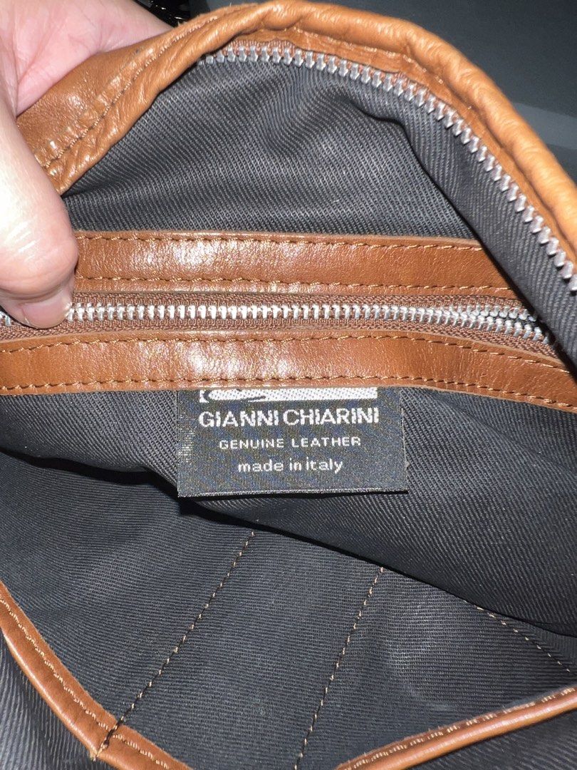 Authentic Gianni Chiarini Genuine Leather Hobo Bag (Category: Shoulder Bags) located in Manila. Submitted by ajdfinds (Listing ID 1469090821, Image 1). Description: • Brand: Gianni Chiarini (With original interior branding label intact) • Origin: Made in Italy • Material: 100% Premium Genuine Leather • Color: Vintage Tan / Cognac Brown • Hardware: Heavy-duty silver-tone hardware, featuring a unique front swivel pinch-clip closure and matching lea