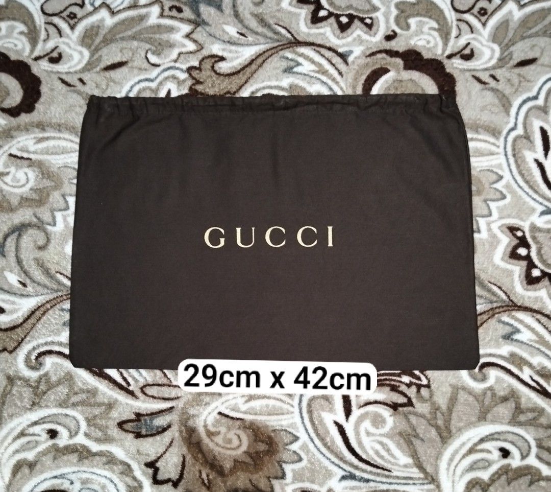 Authentic GUCCI dust bag dustbag (Category: Luxury Bags & Wallets) located in Zamboanga. Submitted by luxuryaccessories_ella.2022 (Listing ID 1469078250, Image 1). Description: Authentic 👉looks new 👉sized by cm ( centimeters) 👉 already wash 👉add sf 👉Loc po is Mindanao 👉 shipping thru J &T add 89 sa sf 👉MOP:Gcash or BPI.