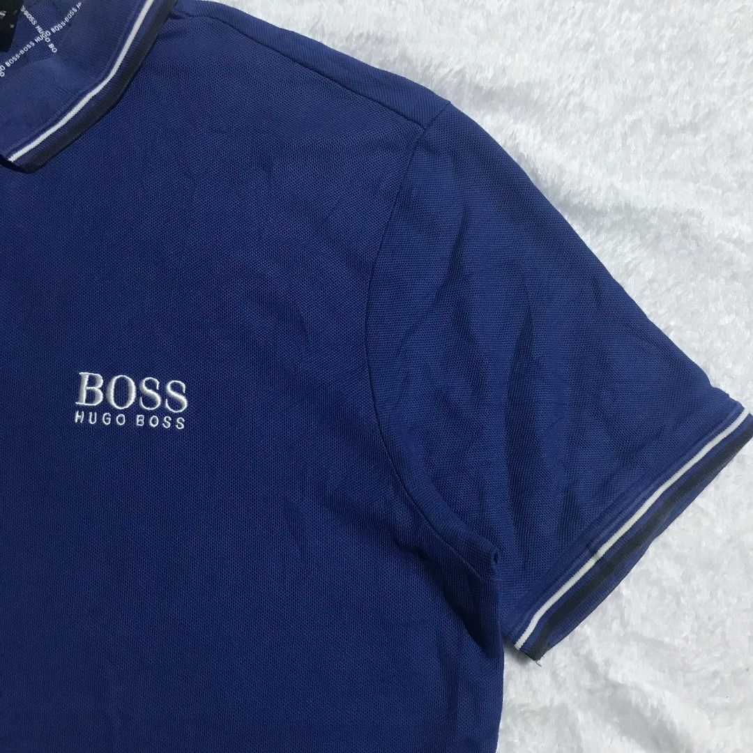 (Authentic) HUGO BOSS POLO (Category: Activewear) located in Cebu City. Submitted by kevinthrift (Listing ID 1468964616, Image 3). Description: HUGO BOSS POLO SHIRT Excellent Condition Size: Medium Dimes: Length 26 | Width 21 Color rate 9/10 ISSUE: fade neck Need wash.