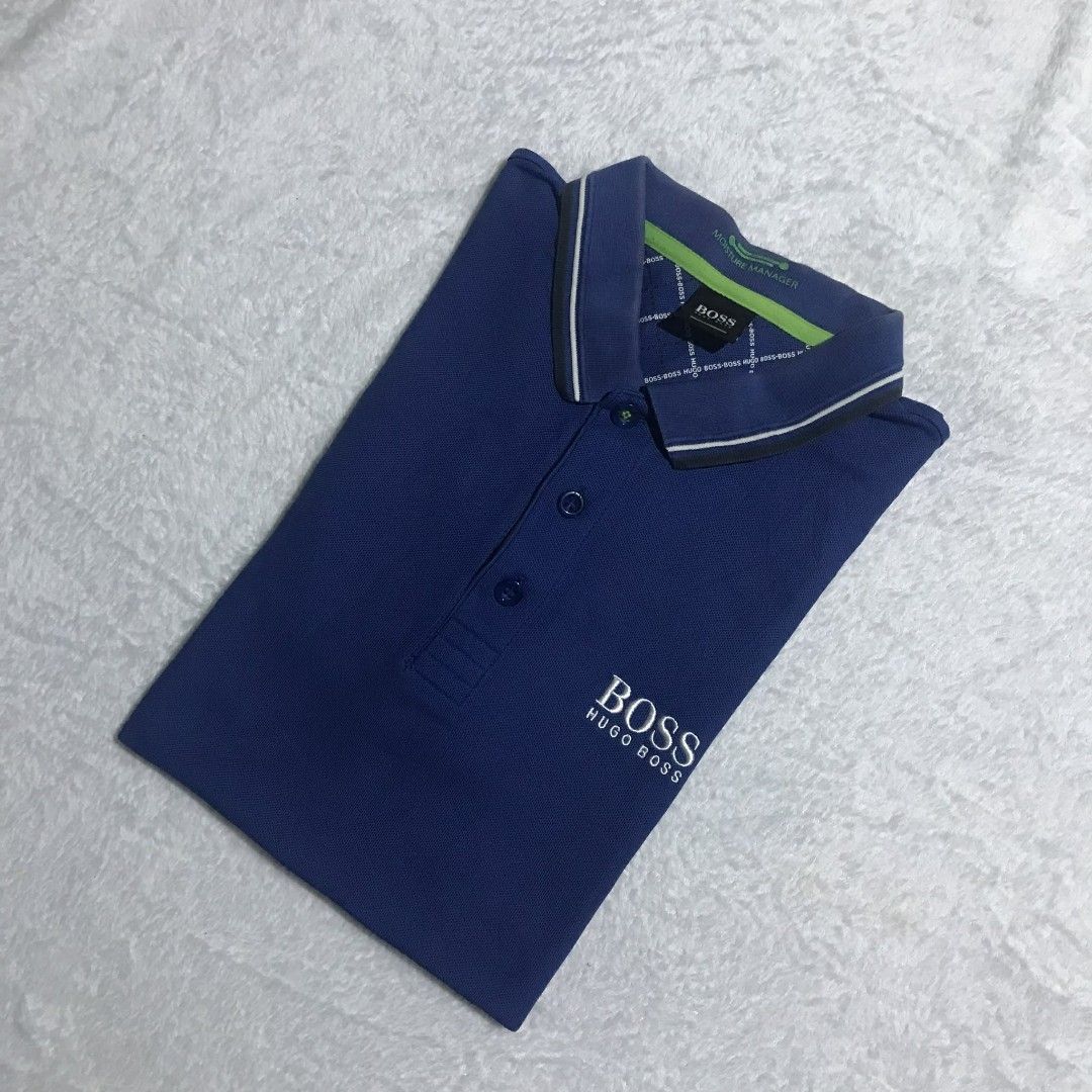 (Authentic) HUGO BOSS POLO (Category: Activewear) located in Cebu City. Submitted by kevinthrift (Listing ID 1468964616, Image 1). Description: HUGO BOSS POLO SHIRT Excellent Condition Size: Medium Dimes: Length 26 | Width 21 Color rate 9/10 ISSUE: fade neck Need wash.