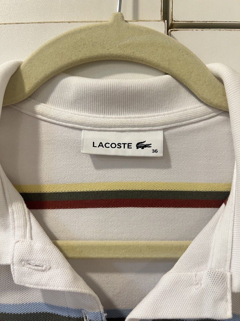 AUTHENTIC Lacoste Polo Shirt (Category: Others Tops) located in Quezon City. Submitted by allianuh.edar (Listing ID 1469108974, Image 2). Description: - authentic Lacoste polo shirt - 600 each - Material: Classic, breathable piqué cotton with button plackets - Condition: Clean, well-maintained, and ready to wear.