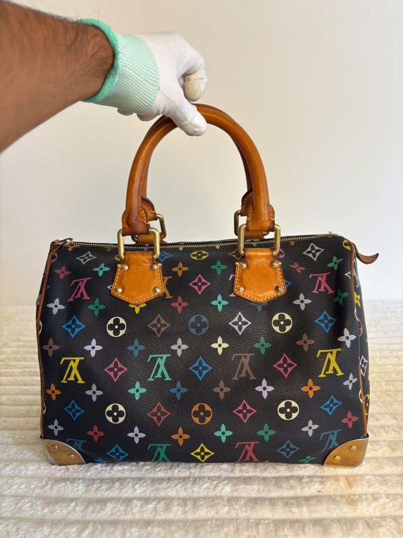 Authentic Louis Vuitton Murakami Multicolor Monogram Speedy 30 Handbag (Category: Luxury Bags & Wallets) located in San Juan, La Union. Submitted by xoxoluvmiffy (Listing ID 1469160834, Image 2). Description: slightly negotiable selling for a friend details: GA with COA intact date code/serial code with dust bag included issue: minimal hardware hairlines only mop: gcash .