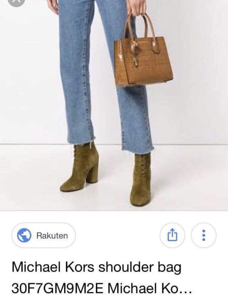 Authentic Michael Kors Limited Edition Bag (Category: Shoulder Bags) located in Manila. Submitted by yunah08 (Listing ID 1469088965, Image 2). Description: Bought it in USA but never used. Flawless condition. Small bag as seen in photo. .
