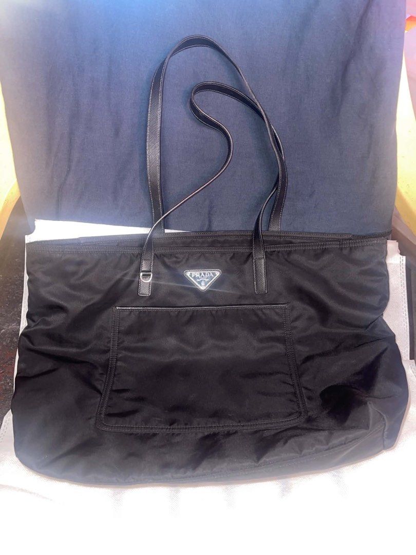 Authentic prada (Category: Luxury Bags & Wallets) located in Manila. Submitted by bhokzz (Listing ID 1469080023, Image 1). Description: Bag only Issue last picture Bery nice condition in actual.