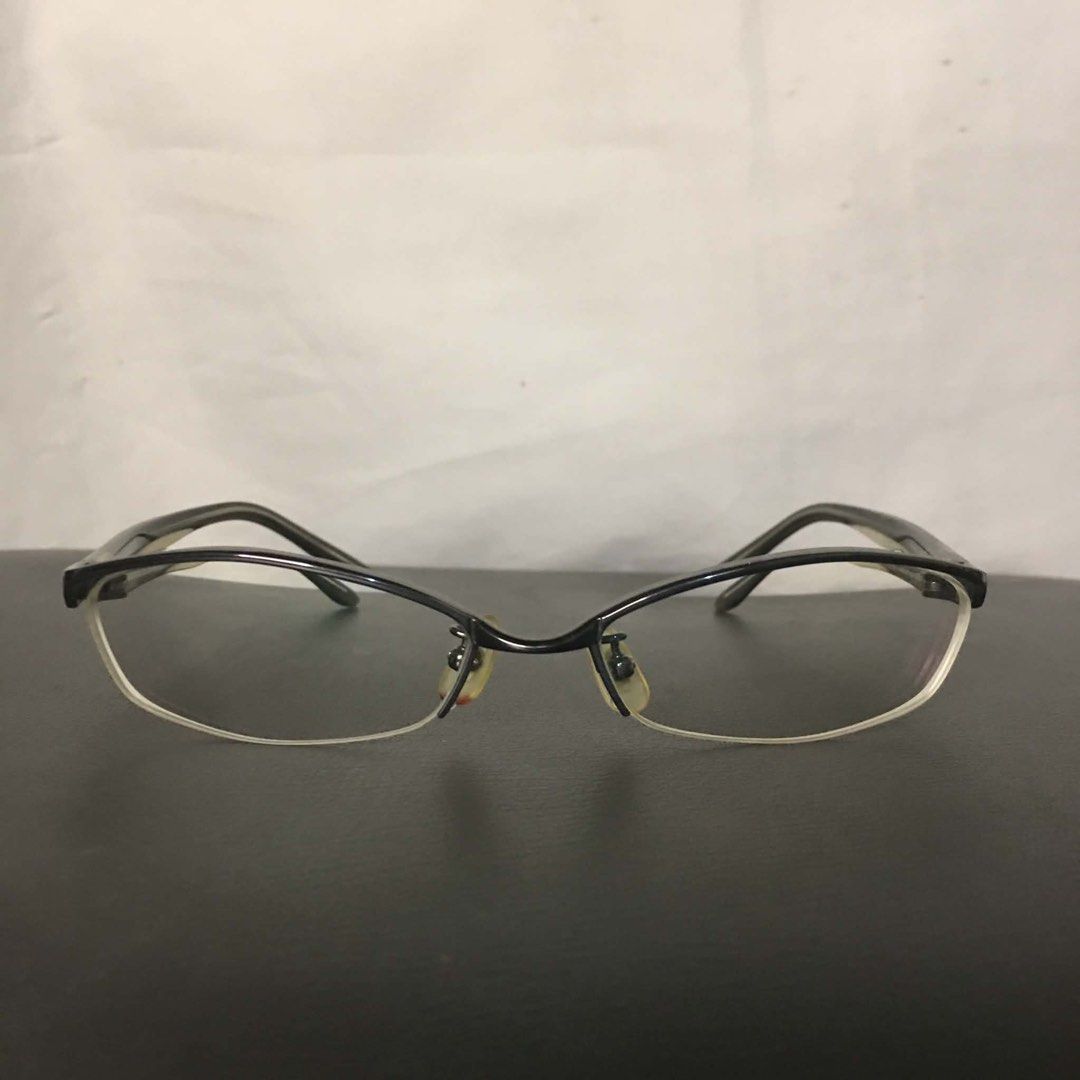 Authentic RAY-BAN Titanium (RB 8560) Semi-Rimless Optical Frames (Category: Sunglasses & Eyewear) located in Makati City. Submitted by tasteofluxury (Listing ID 1469004158, Image 1). Description: Authentic RAY-BAN Titanium (RB 8560) Semi-Rimless Optical Frames Upgrade your everyday style with these ultra-lightweight executive frames from RAY-BAN. Crafted from pure Titanium, this RB 8560 model offers extreme durability, flexibility, and all-day co