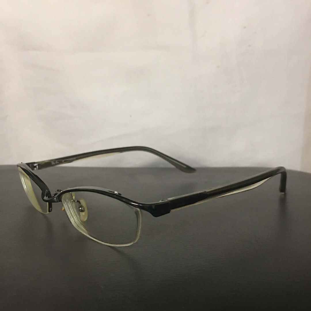 Authentic RAY-BAN Titanium (RB 8560) Semi-Rimless Optical Frames (Category: Sunglasses & Eyewear) located in Makati City. Submitted by tasteofluxury (Listing ID 1469004158, Image 2). Description: Authentic RAY-BAN Titanium (RB 8560) Semi-Rimless Optical Frames Upgrade your everyday style with these ultra-lightweight executive frames from RAY-BAN. Crafted from pure Titanium, this RB 8560 model offers extreme durability, flexibility, and all-day co