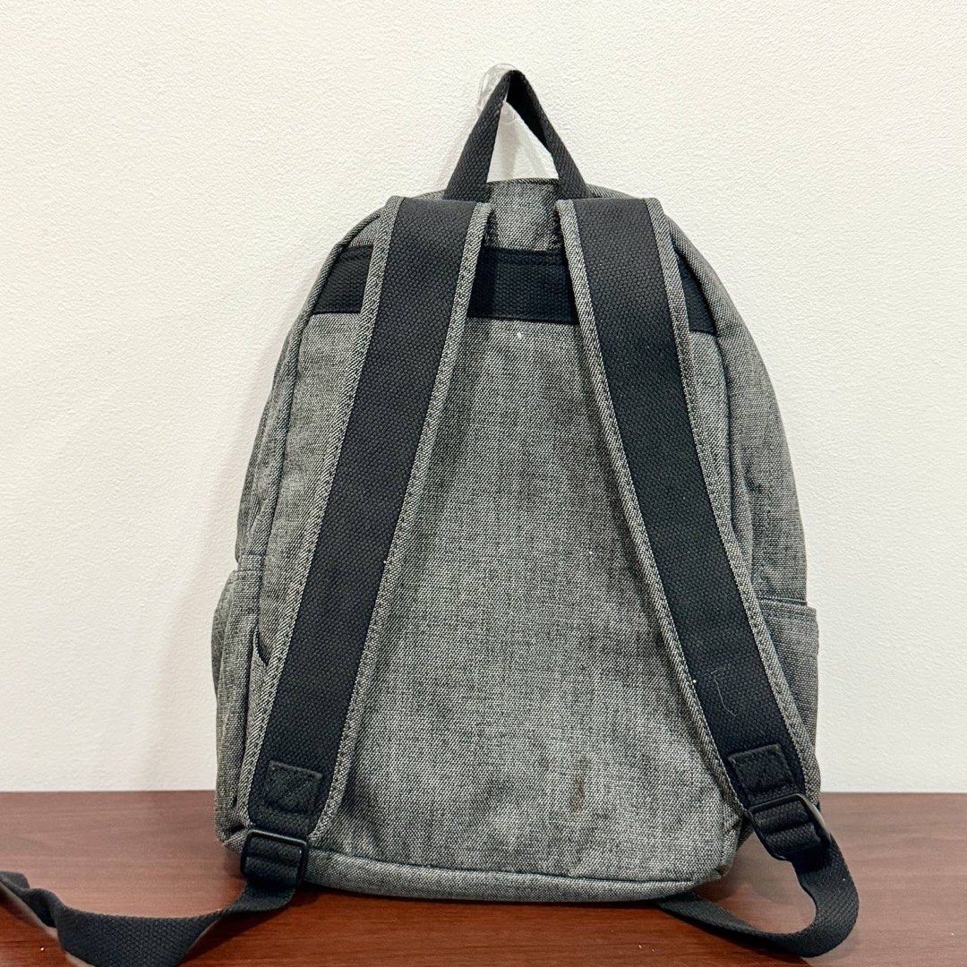 [Authentic] Used Kipling Backpack Gray Black Monkey Keychain Zip Pockets Checkered Lining (Category: Backpacks) located in Quezon City. Submitted by brandedusagoodies (Listing ID 1469117868, Image 2). Description: Used Kipling backpack in gray with the Kipling logo patch, a front zip pocket, side pockets, a top handle and adjustable padded straps. Comes with a black Kipling monkey keychain. The inside has a checkered Kipling lining with a zip poc