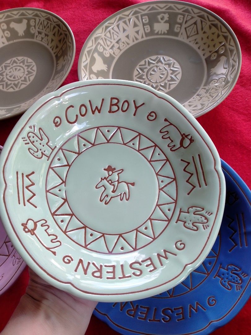 Aztec and Cowboy design 180 each (Category: Dinnerware & Cutlery) located in Manila. Submitted by margeventa (Listing ID 1468983969, Image 2). Description: - Set of 5 stoneware pieces: 3 colorful plates with cowboy graphics and scalloped edges (blue, light green, pink) plus 2 grey patterned bowls - Distinct western and aztec patterns add a unique rustic charm - Versatile use: great for daily dining or as home display decor - Perfect housewarming 