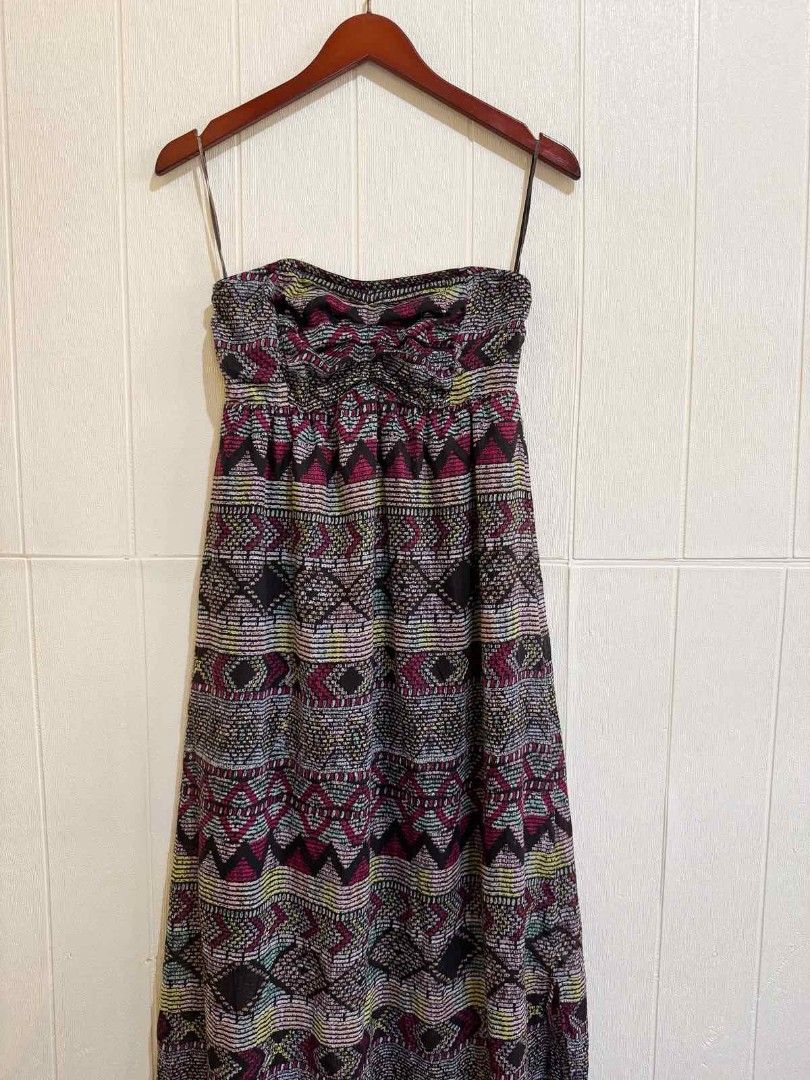 Aztec Print Strapless Maxi Dress (Category: Dresses) located in Calamba. Submitted by iam.hides (Listing ID 1469009498, Image 3). Description: - Style: Long strapless maxi dress with vibrant multi-color Aztec geometric print - Details: Sweetheart neckline with gathered knot at the bust, includes removable thin spaghetti straps - Fabric: Flowy, lightweight, and breathable in shades of black, magenta, yellow, and turquoise - Perfect for: Warm weath